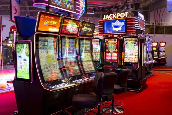 Live blackjack dealer with multi-camera studio setup showing table and cards clearly